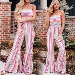 Striped jumpsuit with flare bottom. Never worn
